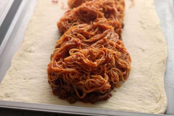 Add spaghetti to dough